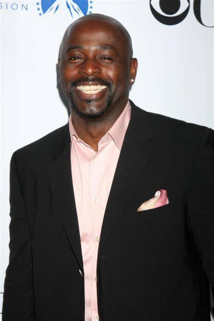 Alimi Ballard clicked while giving an interview in his blue tuxedo.