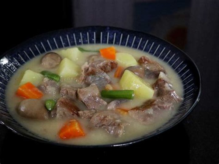 Beef stew in a white bowl