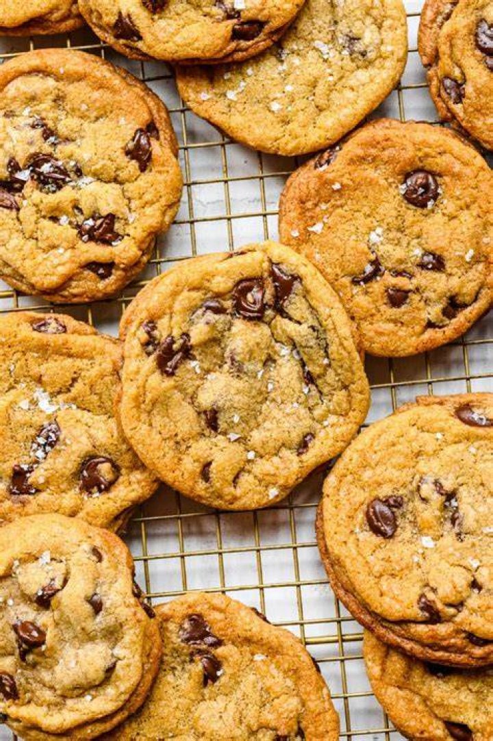 Chocolate chip cookies with a bite taken out of it.
