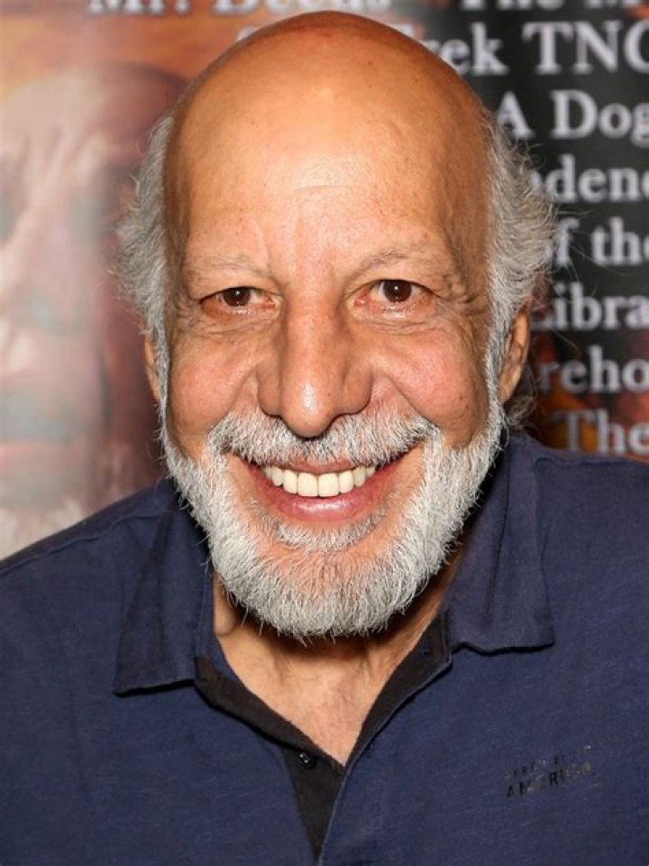 Erick Avari photographed with a hat on.