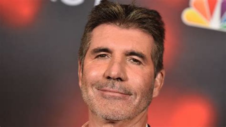 Simon Cowell's Fashion Statement: Red-Tinted Glasses