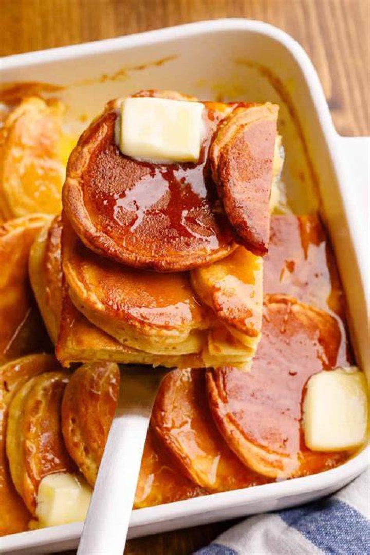 Slice of pancake casserole on a white plate.