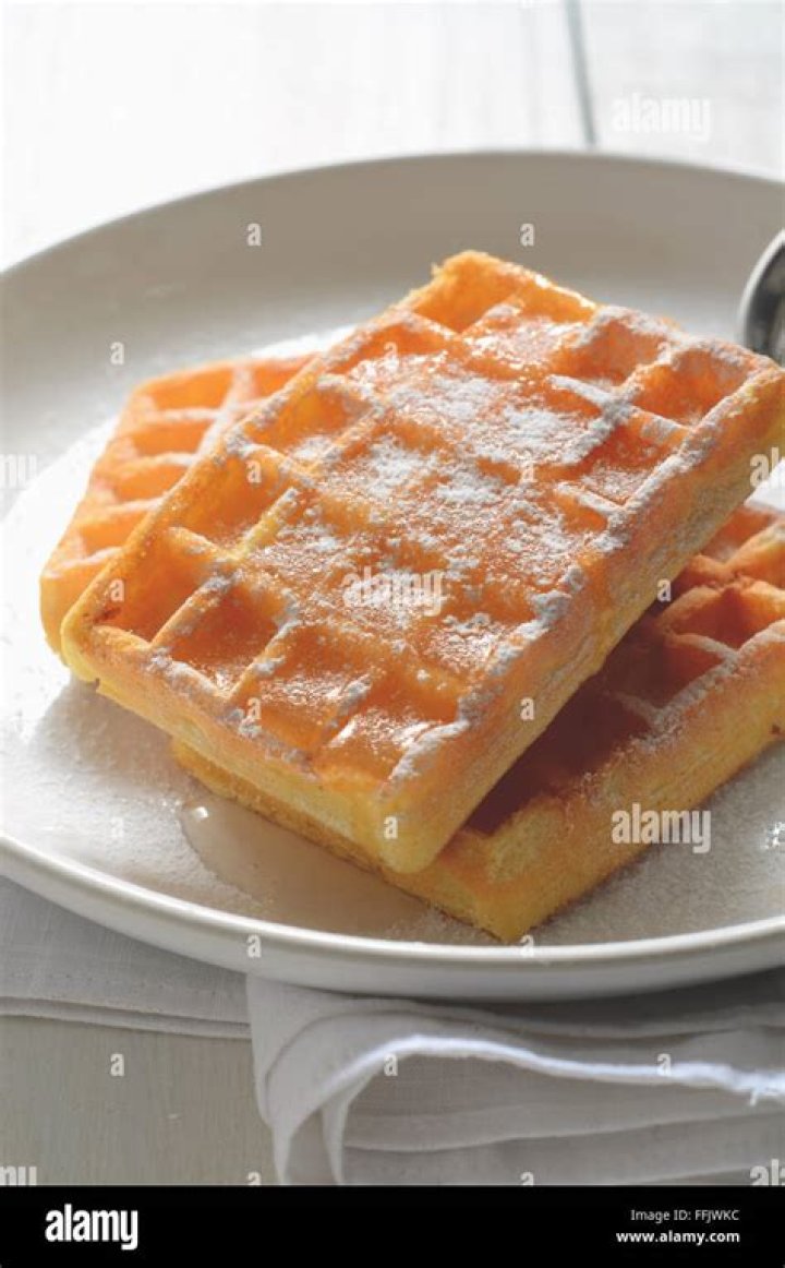 Waffles on a white plate.
