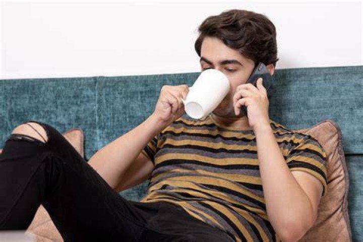 Young Boy with Coffee